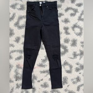 Topshop black ripped Jamie jeans. Size 25